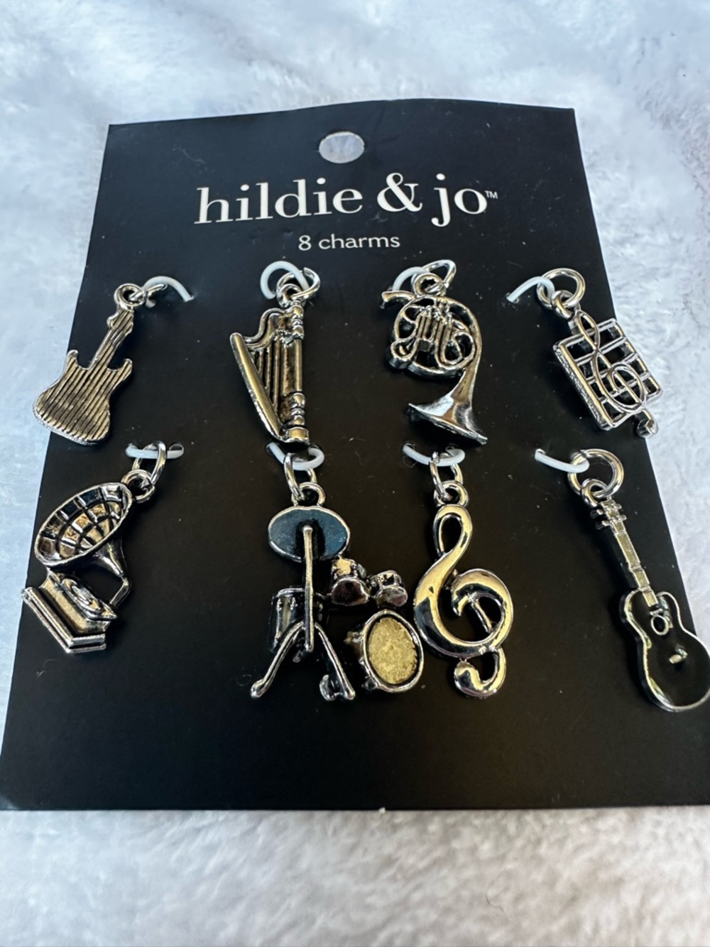 Bundle of music charms with jump rings